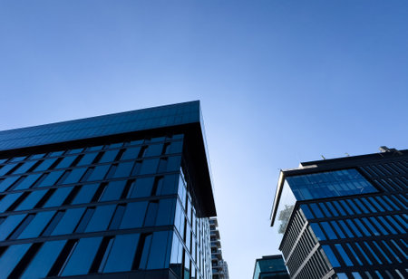 Architecture details Glass wall Modern building exterior Abstract futuristic backgroundの写真素材