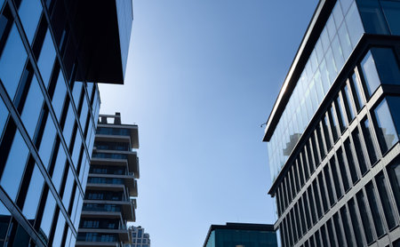 Looking Up Blue Modern Office Buildingの写真素材