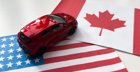 national flag of Canada, usa, cargo van, international trucking, cargo transportation concept, combined transport around world, logistics services for business, fast delivery of goodsの写真素材