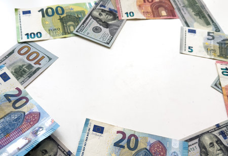 Multi currency note, bank bills and coins indicate world economy during war crisis. Money relate to all circumstances in the world events including stock exchange and fair trade link between countriesの写真素材