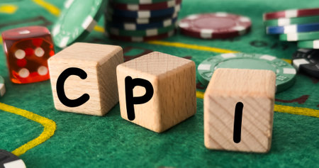CPI, consumer price index symbol. Wooden blocks with words CPI, consumer price index on dollar bills with a calculator, coins. Business and CPI, Business and consumer price index concept.の写真素材