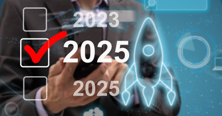 Market trend for 2025. Businessman touching virtual number 2025 for new year concept. End of the old year and start of new business in 2025.の写真素材