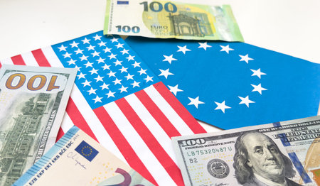 dollar money and American flag. business crisis finance dollar concept. close-up of a usd hand...