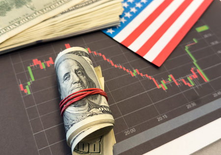 Crisis in USA, rising inflation, devaluation of dollars and the economy. Stock market trading graph with american flag is damage.Effect of recession US economyの写真素材
