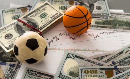 Football and money. Online bet - sports betting and gambling addiction - sport and soccerの写真素材