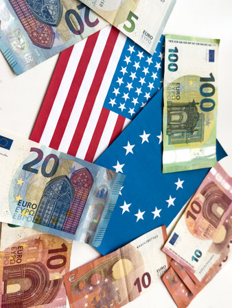 us and european union flags with dollar banknotesの写真素材