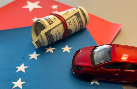 economic war background concept, car standing on flag of the European Union and CHINA flagsの写真素材