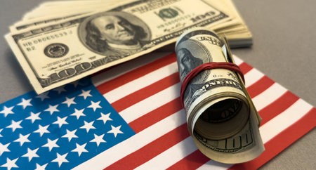 dollar money and American flag. bankrupt man counting money cash. business crisis finance dollar concept. close-up of a usd hand counting paper dollars. exchange finance economy dollar pay taxの写真素材