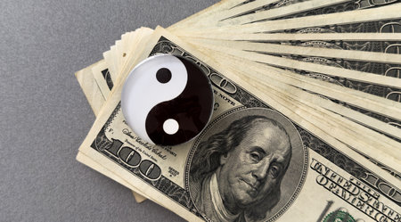 a yin-yang symbol on banknotes.の写真素材