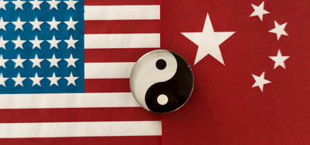 Yin Yang Symbol on flags backgroundの写真素材