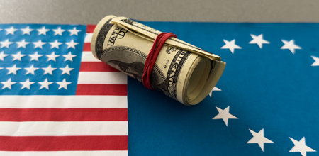 dollar money and American flag. exchange finance economy dollar pay taxの写真素材