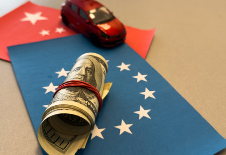Car on the dollar money and usa flag and the flag of the European Unionの写真素材