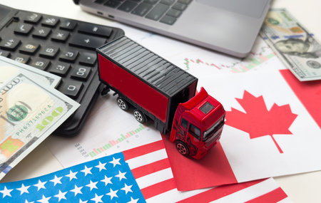 flags of the USA and Canada, dollars, chartsの写真素材