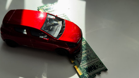 toy car model and microcircuit chipの写真素材
