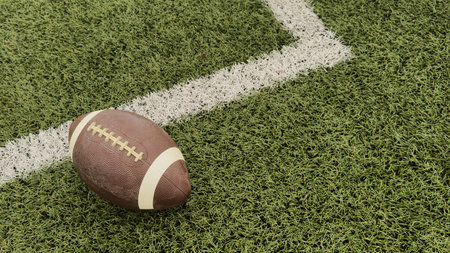 American football on football field backgroundの写真素材