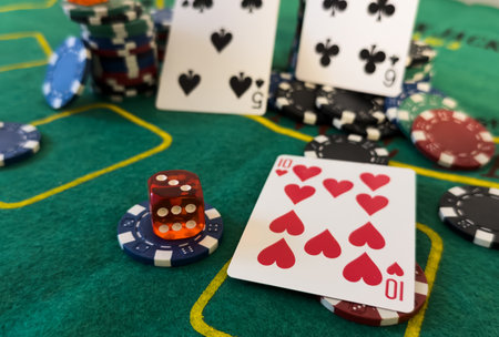Poker cards with win combination. The player hand holds a winning combination in a game in a poker The concept of luck in the poker game A winning combination in poker is two aces on a table of chipsの写真素材