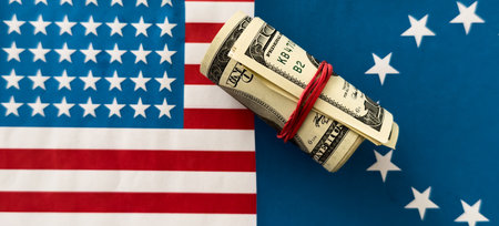 USD with the American flag arranged as a border with copy space, foreign exchange and currenciesの写真素材