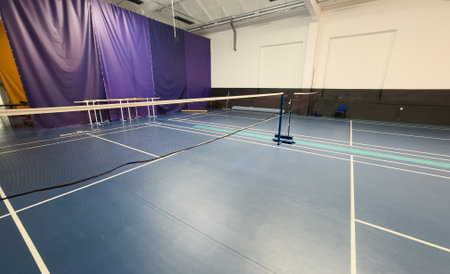 empty badminton court with spot lightの写真素材