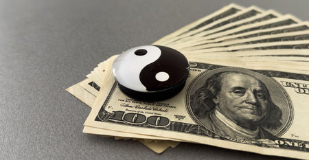 shot of a yin-yang symbol on banknotes.の写真素材