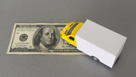 a toy truck is on the banknotes