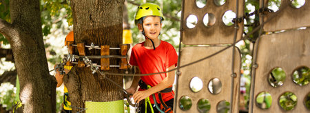 Brave kids climbs in rope park, playgroundの写真素材