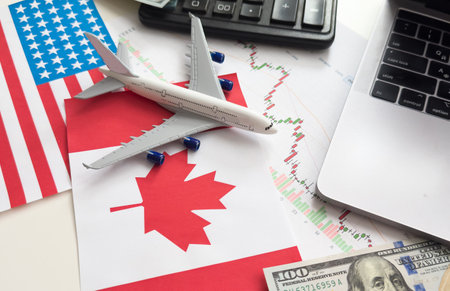 flags of the USA and Canada, dollars, chartsの写真素材