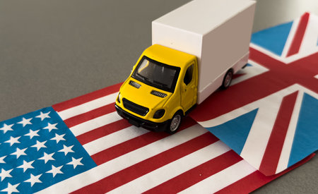 Miniature toy. There is american flag, toy of truck.の写真素材