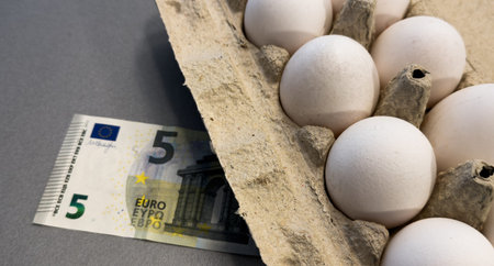 Roll of dollars with eggs stock photo