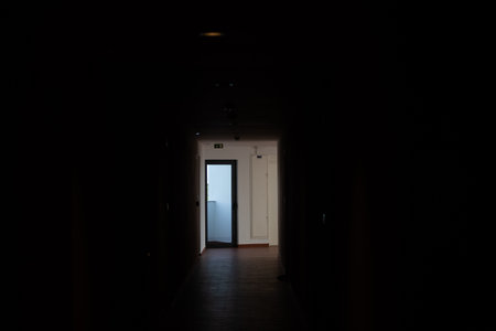front view Dimly-lit corridor backgroundの写真素材