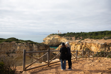 mother and daughter walking in the beautiful Algarve,の写真素材