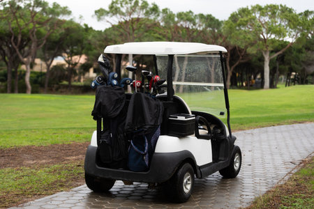 drive in a golf cart along a winding pathの写真素材