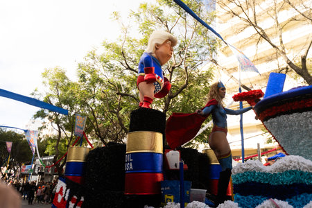 LOULE, PORTUGAL , 15 FEB 2026: Colorful Carnival Carnaval Parade festival participants on Loule city, Portugal.のeditorial素材