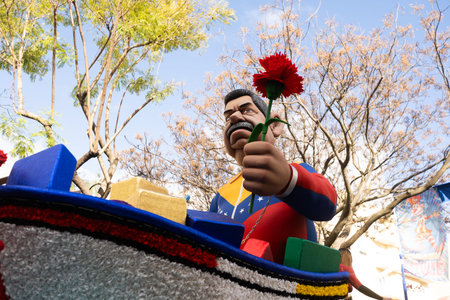 LOULE, PORTUGAL , 15 FEB 2026: Colorful Carnival Carnaval Parade festival participants on Loule city, Portugal.のeditorial素材