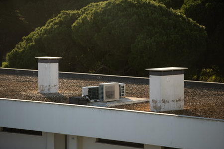 The external units of the commercial air conditioning and ventilation systems are installed on the...