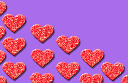 Red abstract hearts patterns on purple background.