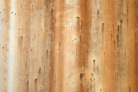 Old rusty dripping stained background texture with dripping rusty lines creates unique background textureの写真素材