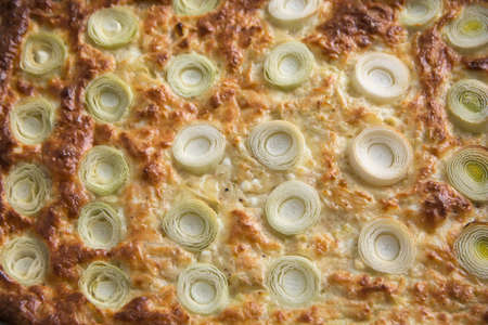 Close up of a Leek pie, with chunks of leek on topの写真素材