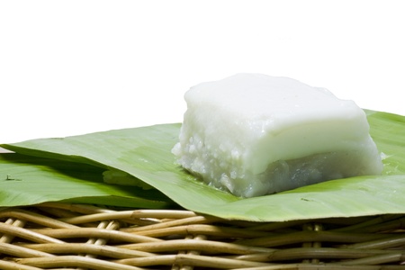 Taro custard topped with coconut layer on banana leafの写真素材