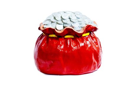 Coin pile in red bag, made from plasterの写真素材