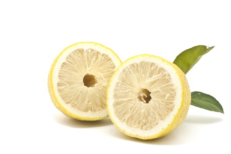 Half Japanese lemon isolated on white backgroundの写真素材