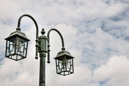 Street lamp on sky background