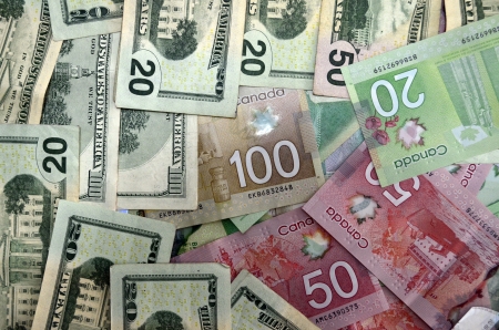 Money, Canadian and US Dollar bills