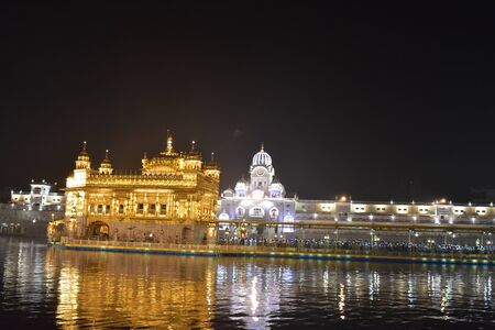 selective focused beautiful view of golden temple shri Harmandir Sahib in Amritsarの写真素材