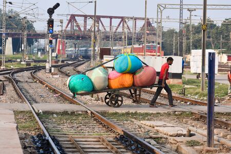 view of labour called cooly in an Indian railway stationの写真素材