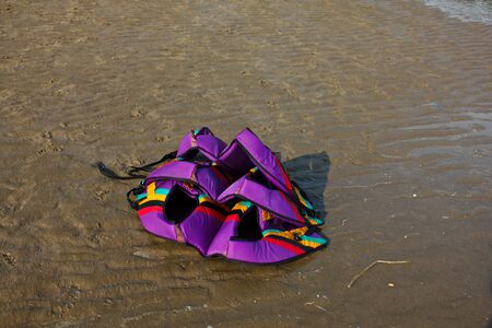 Stock Photo - colorful vest jacket on the beachの写真素材