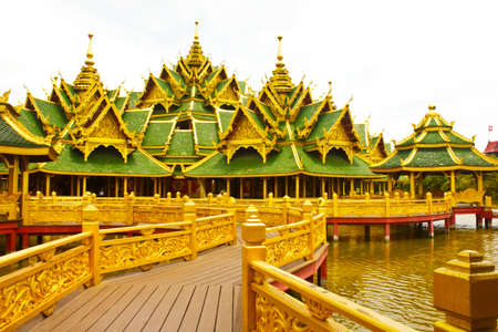 Nice old wooden bridge in park at summertime.の写真素材