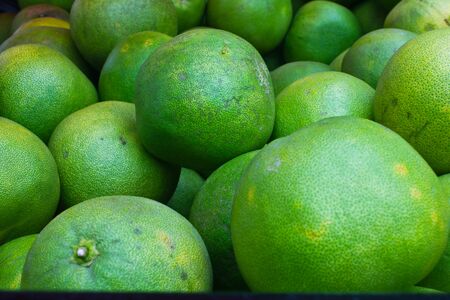 Stock Photo - Grapefruit at a market stallの写真素材
