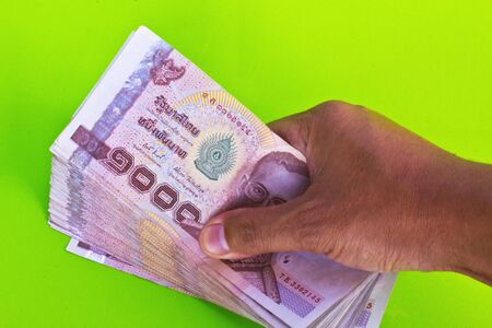 Stock Photo -  money in man handsの写真素材