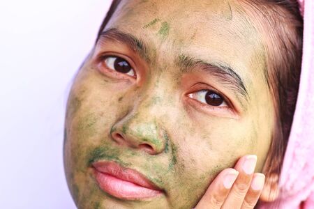 Stock Photo - Spa Mud Mask on the woman's faceの写真素材