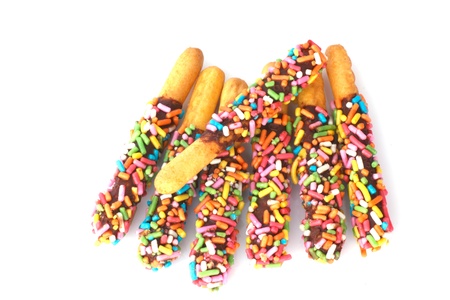 Stock Photo - colorful biscuit in balck dish  on white backgroundの写真素材